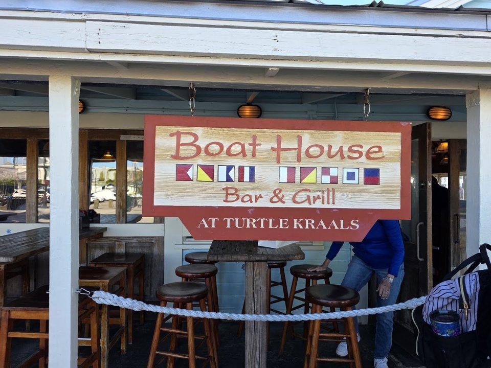 Waterfront restaurant exterior with harbor views.