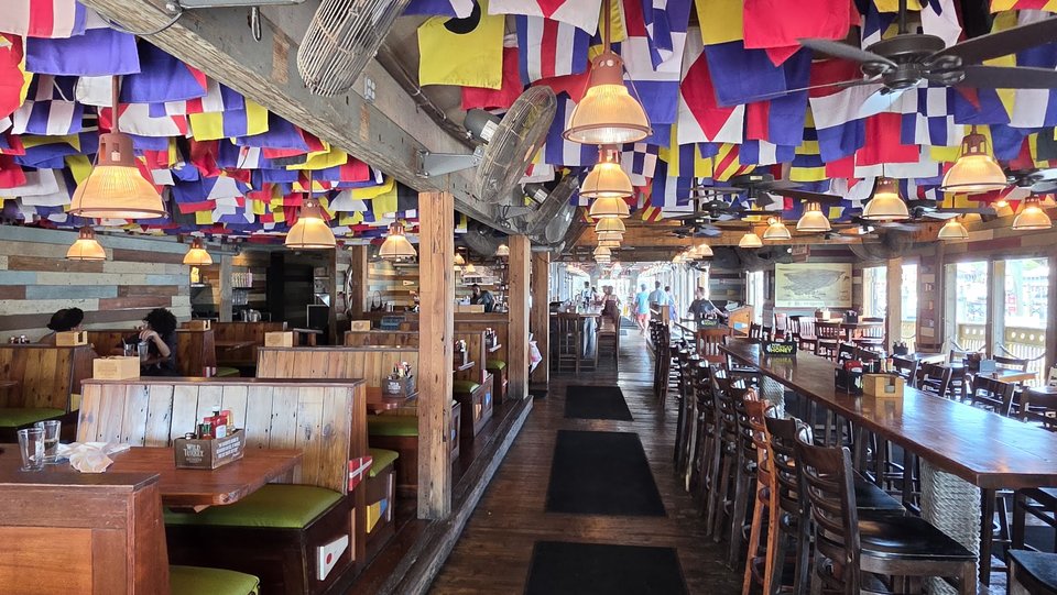 Bright restaurant interior with coastal decor.