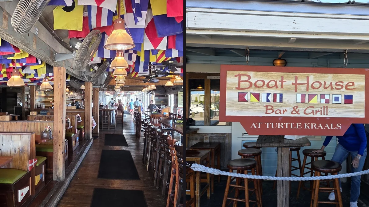 Harborfront dining room with nautical flags overhead.